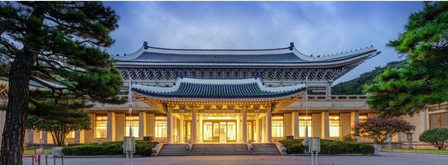 Visit Cheong Wa Dae main building illuminated at dusk in Seoul