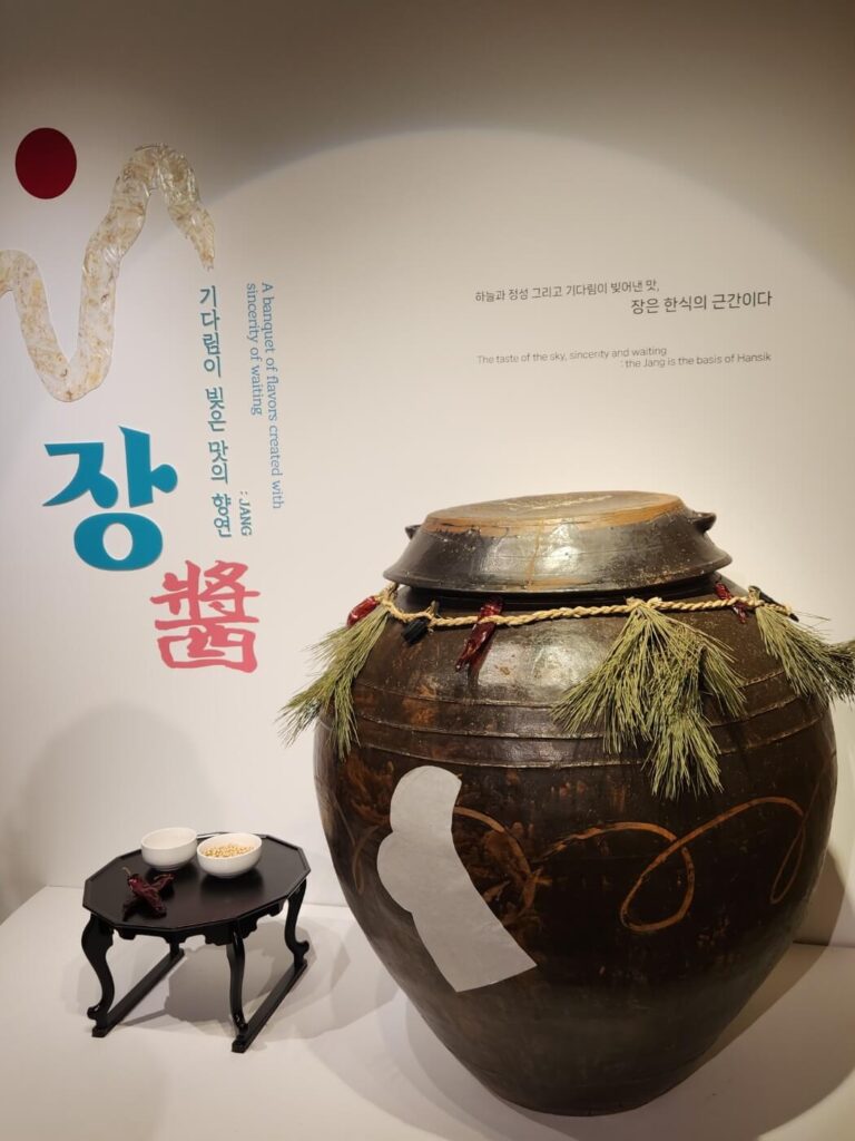 Display of traditional Korean fermented sauce jars at Hansik Space E:EUM Seoul, showcasing jang culture.