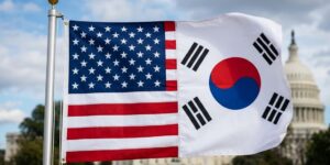 국회를 통과한 대미투자특별법 수혜주 분석 및 한미 경제 동맹을 상징하는 한국과 미국 국기 합성 이미지